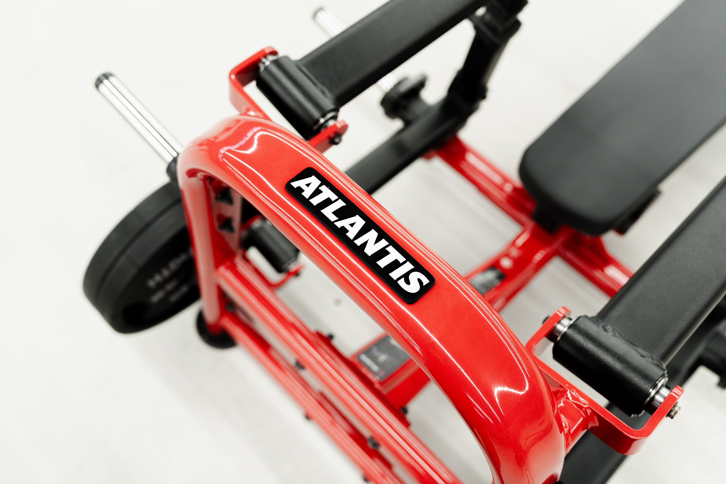 Close-up of a red and black Atlantis plate-loaded machine